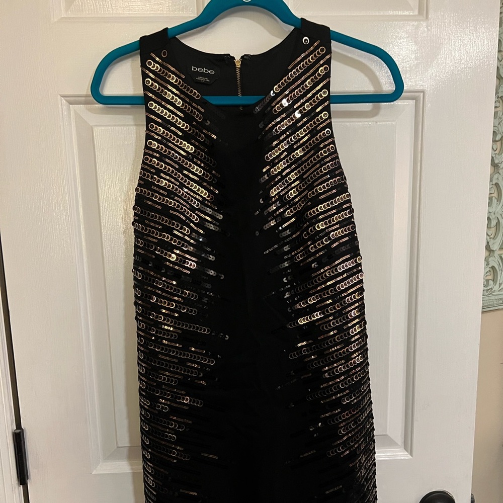 Bebe black with gold sequins size large